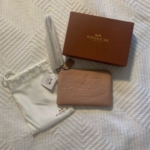 Coach Embossed Horse and Carriage Wristlet
